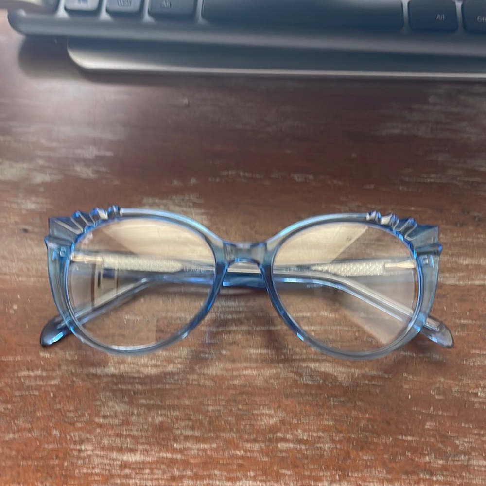 Firmoo blue transparent eyeglasses. 3037 C5 52 19 142 cat eye with beveled edge.